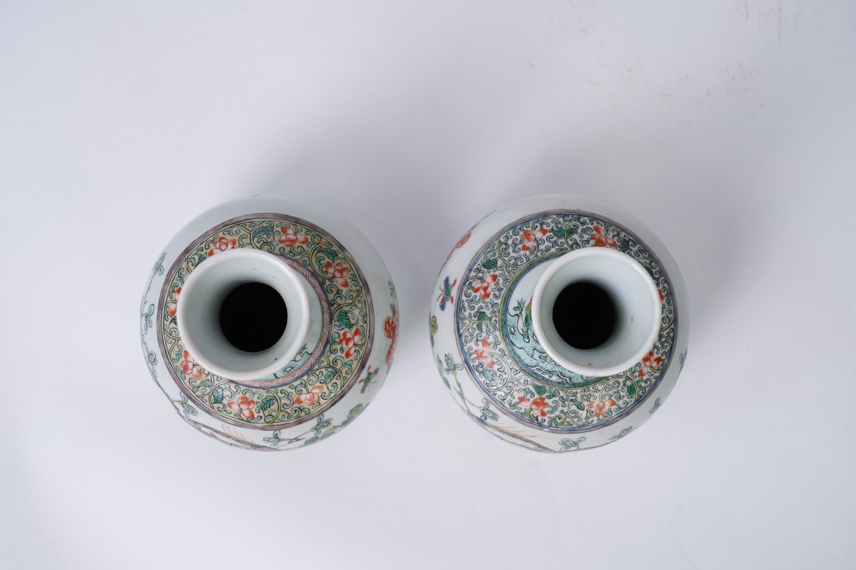 A pair of Chinese famille verte bottle vases, early 20th century